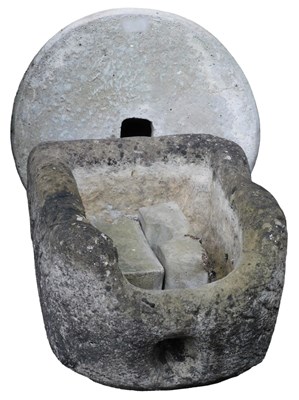 Lot 746 - A millstone, together with a stone feeding...