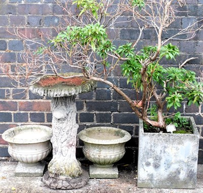 Lot 750 - A reconstituted stone planter, of square form,...