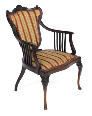Lot 707 - A Victorian mahogany armchair, with a shell...