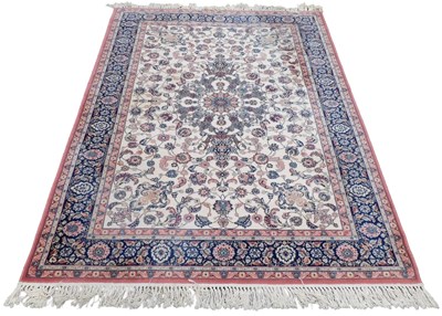 Lot 760 - A Super Taj pink ground rug, decorated with...
