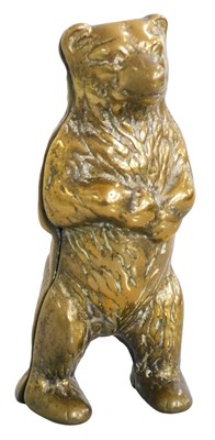 Lot 175 - An early 20thC brass money box, modelled as a...