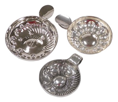 Lot 177 - Three silver plated wine tasters, one...