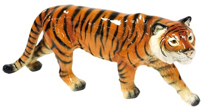 Lot 186 - A Goebel pottery figure of a tiger, modelled...