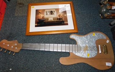 Lot 2138 - A wooden wall art guitar and a framed...