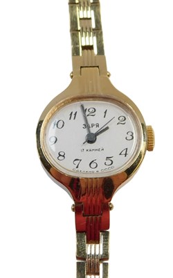 Lot 248 - A SABR lady's wristwatch, with oval white...