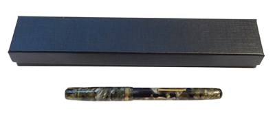 Lot 680 - A Watermans marble effect fountain pen, with a...