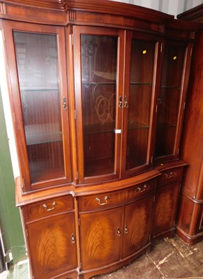 Lot 1064 - A mahogany veneered bow front display cabinet,...