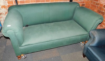 Lot 1013 - An early 20thC drop arm Chesterfield sofa, in...