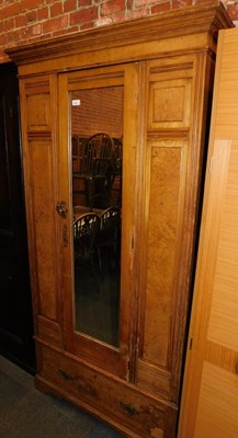 Lot 1022 - An Edwardian walnut double wardrobe, with a...