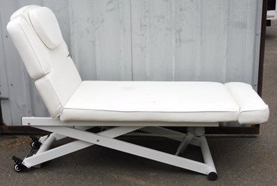 Lot 1204A - A DIR white leatherette rise and fall...