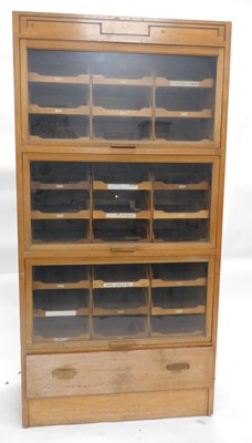 Lot An early-to-mid 20thC light oak haberdashery...