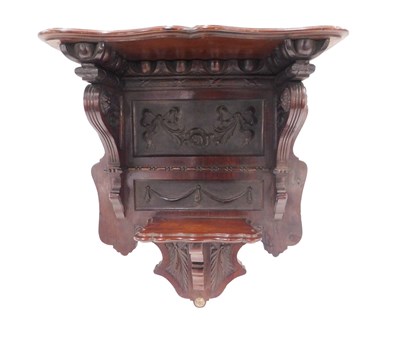 Lot 260 - An Edwardian mahogany clock bracket, with...