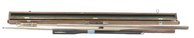 Lot 273 - Three various snooker cues, comprising a cased...