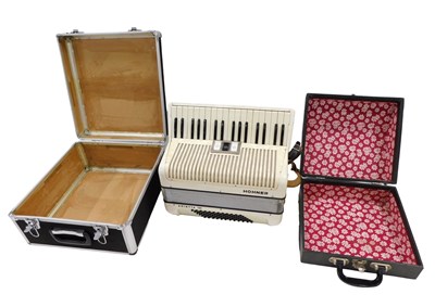 Lot 330 - A Hohner Arietta accordian, in cream case,...