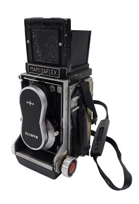 Lot 408 - A Mamiya Flex reflex camera, number 100428.