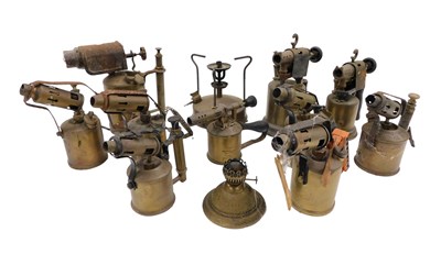 Lot 411 - A collection of oil lamp parts, comprising oil...