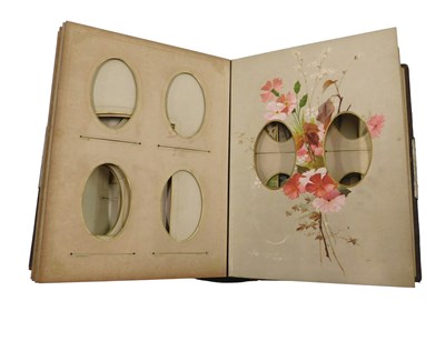 Lot 445 - A mid 20thC leather bound photograph album,...