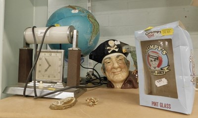 Lot 2011 - A mid century bedside lamp, with clock,...