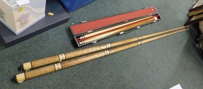Lot 2038 - A cased Riley snooker cue, together with two...