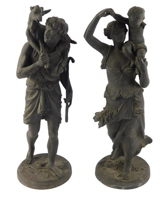 Lot 122 - A pair of 20thC spelter figures, depicting...