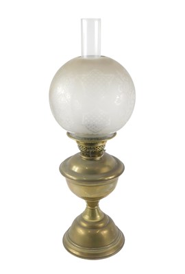 Lot 126 - A 20thC brass oil lamp, with a floral and...