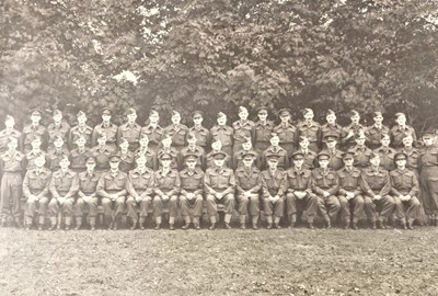 Lot 165 - A black and white photograph showing members...