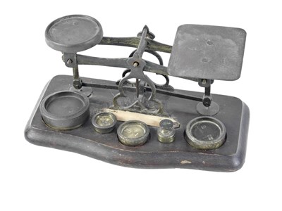 Lot 176 - A set of brass postal scales, and a small...