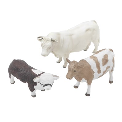 Lot 459 - Three matte ceramic cows, comprising a Beswick...
