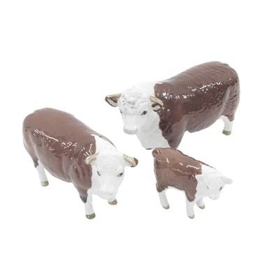 Lot 461 - Three Beswick Hereford cows, comprising bull,...