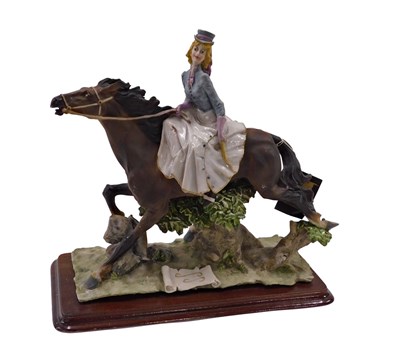 Lot 504 - An Art Nova Continental porcelain figure, of a...