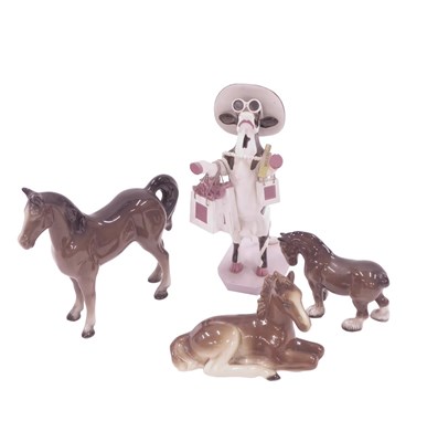 Lot 477 - Four ceramics, comprising three ceramic horses...