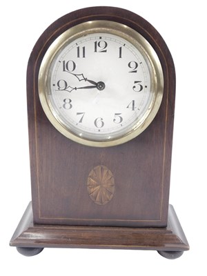 Lot 219 - An Edwardian mahogany domed top mantel...