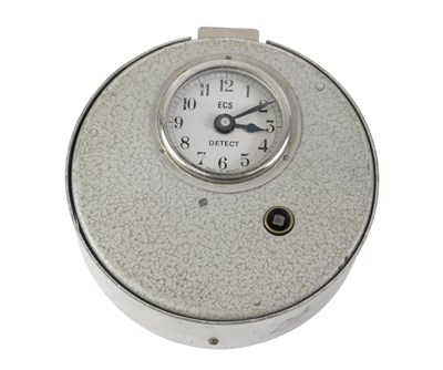 Lot 220 - An ECS Detect Guardsman clock, in a stainless...