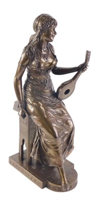 Lot 103 - A 20thC bronze figure of a female mandolin...