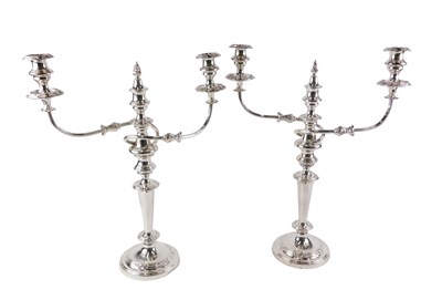 Lot 104 - A pair of silver plated three branch...