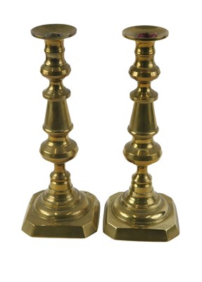 Lot 112 - A pair of 20thC brass candlesticks, 30cm high.