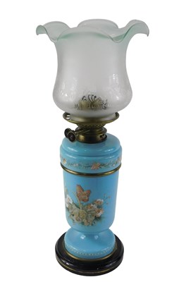 Lot 116 - A Victorian oil lamp, on a blue glass body,...
