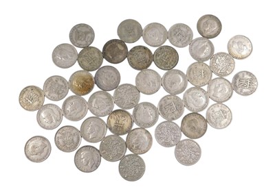 Lot 613 - A group of pre-1946 six pence pieces, 115g.