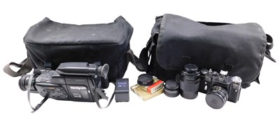Lot 653 - A group of camera equipment, comprising a...