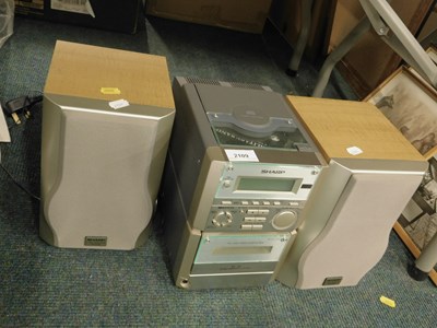 Lot 2109 - A Sharp XL60H mini hi-fi, with cassette player...