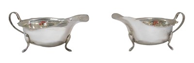 Lot 660 - A pair of George VI silver sauce boats, with...