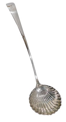 Lot 26 - A George III silver fiddle pattern ladle, with...