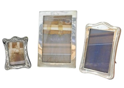 Lot 663 - Three Elizabeth II and later silver photograph...