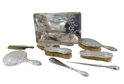 Lot 29 - An Edward VII silver nine piece dressing table...