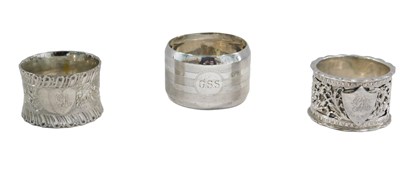 Lot 668 - Three Victorian silver and later napkin rings,...