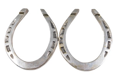 Lot 669 - A pair of George VI silver horse shoe knife...