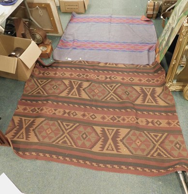 Lot 2153 - A tan throw, with red stripes and Aztec...