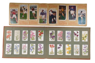Lot 636 - A Player's Navy Cut cigarette card album, with...
