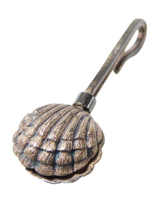 Lot 79 - An Elizabeth II silver shell capped napkin...