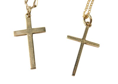 Lot 81 - Two cross pendants and chains, comprising one...